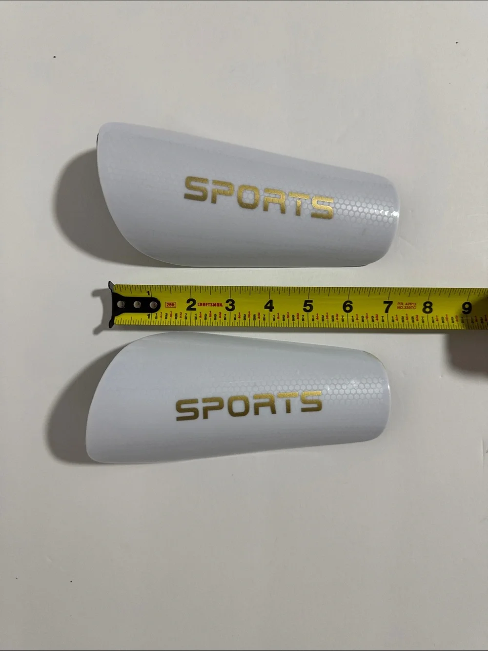Sports White Kids Soccer Shinguards with Gold SPORTS Logo